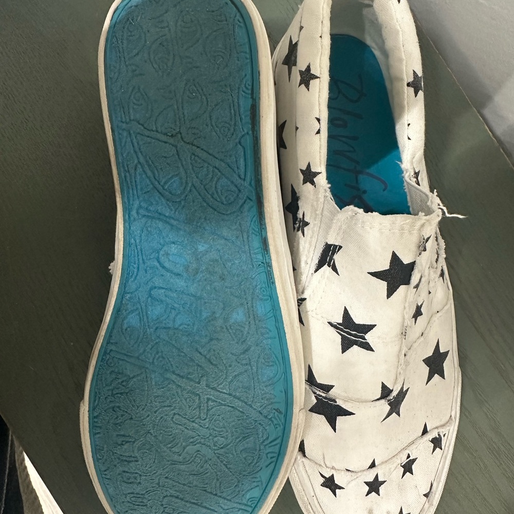 Blowfish White Slip-Ons with Black Stars and Blue Soles